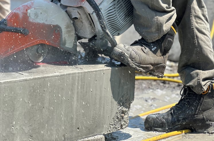 Cutting concrete while wearing FDXL90 Boots